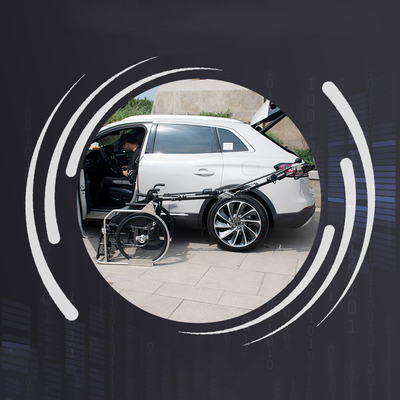 Wheelchair storage robotic arm in trunk