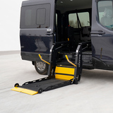 Vertical folding wheelchair lift platform